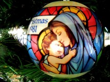 Mary and baby Jesus Christmas ornament decoration on a Christmas Tree at Christmas Time. 