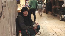 Muslim Homeless Lady Begging on the street corner