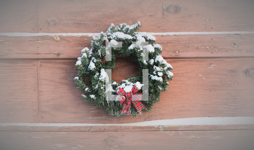 Christmas wreath with white snow 