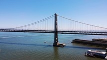 San Francisco Bay Bridge Rising Aerial Shot