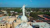 Lady Justice Standing on Top of Waco Texas Courthouse