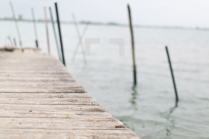 A wooden pier on a lake.