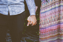 couples holding hands 
