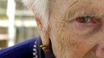 Close up of an elderly woman's face.