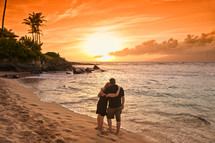 a couple on a tropical beach 