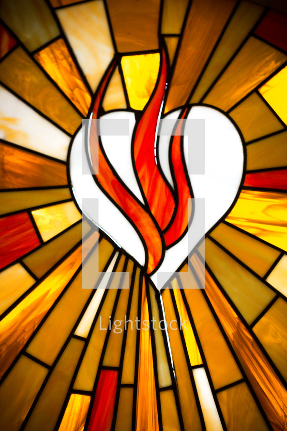 flames over a white heart - stained glass window