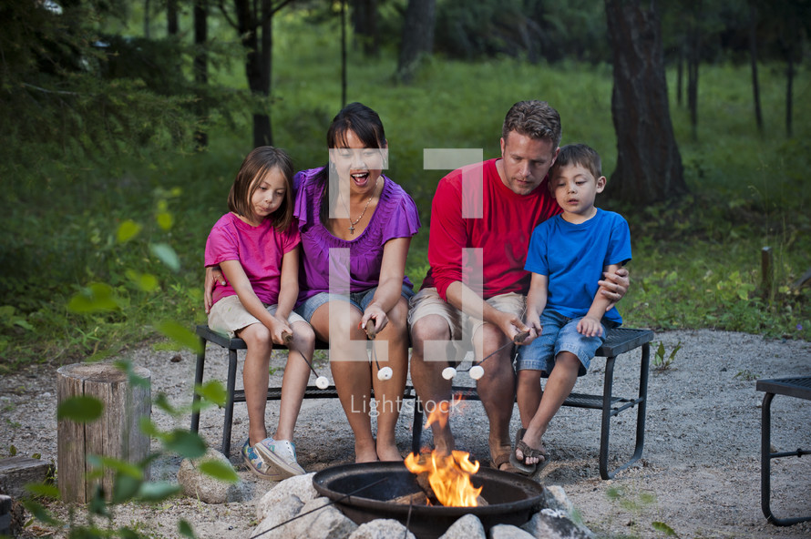 family roasting marshmallows 