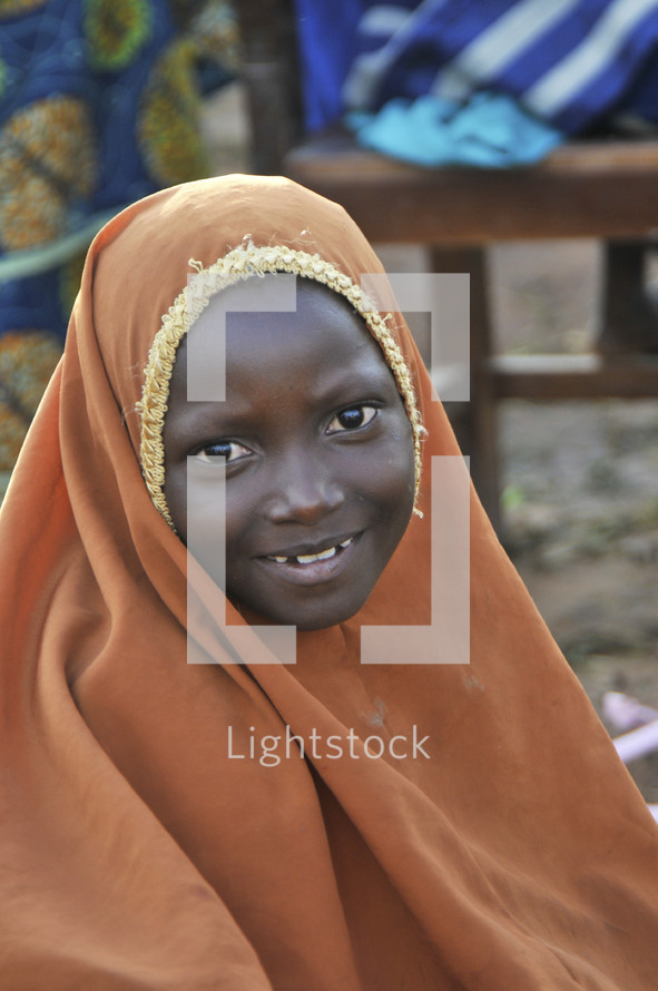 Sundanese Muslim shrouded girl smiling