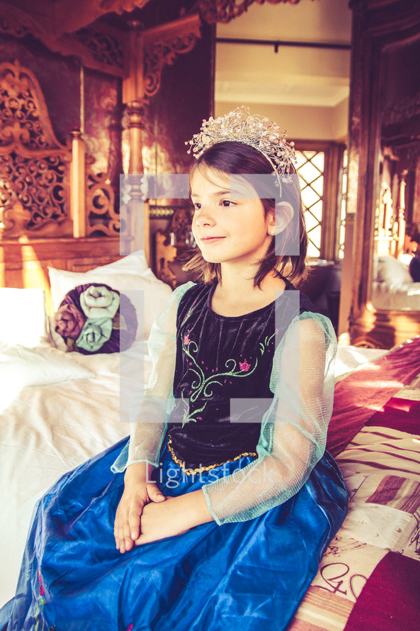 a little girl dressed like a princess 