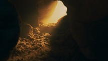 glowing light coming from an empty tomb 