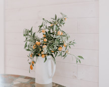 lemon branches in a vase 