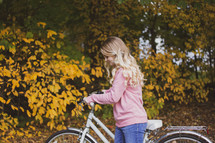 teenage girl with a bike 