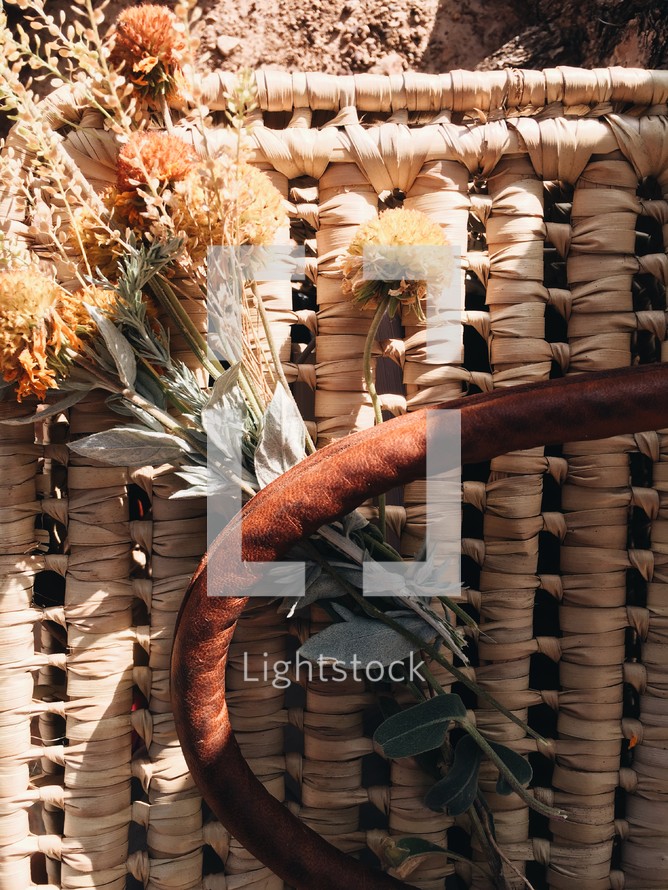 flowers on a picnic basket 