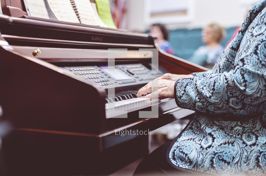a woman playing worship music 