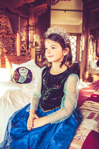a little girl dressed like a princess 