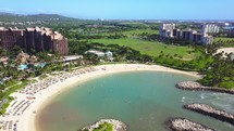 Cinematic aerial view of beautiful luxury resorts in Hawaii.