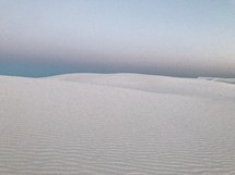 ripples in white sand 