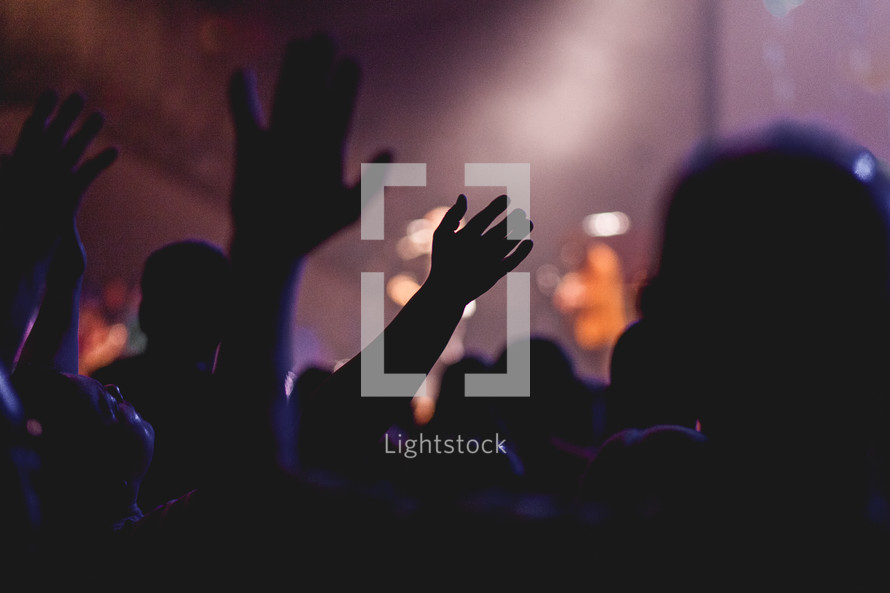 silhouette, raised hands, contemporary worship service, worship 