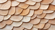 Intricate wooden shingle pattern composed of overlapping, curved plywood pieces, showcasing natural wood grain and smooth textures, ideal for design elements.