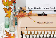 give thanks to the lord in type on a typewriter 