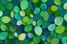 Vibrant eco-themed pattern featuring an array of overlapping leaves in various shades of green and blue. The design emphasizes nature, growth, and sustainability.