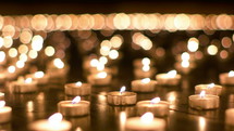 flickering prayer candles 