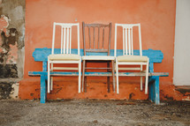 three chairs on an old bench in Tenerife, Spain