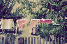 infant clothes on a clothesline 