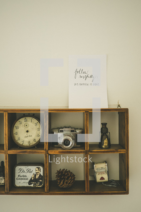 a trinket display box - pinecone, clock, camera, tin, antiques 