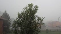 storm with heavy rain falling hailing and gales