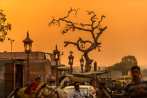 crowded village in India at sunset 