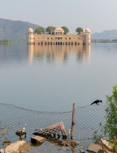 a building surrounded by water in India 