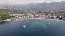 Aerial panoramic shot of Himare Coastline, a Travel destination with turquoise seascape, Albania