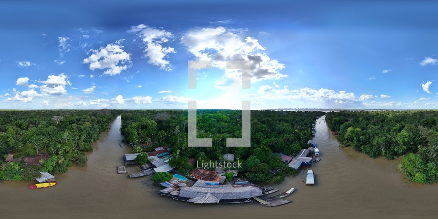 360 aerial photo taken with drone of restaurants on small river in middle of Combú Island in Belém, Pará, Brazil