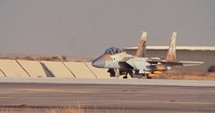 Israeli Air Force F15 fighters taxiing on the runway before takeoff