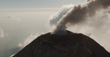 Strong volcanic activity of Fuego volcano in Guatemala. Aerial orbit	