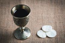 Small chalice and wafers for communion