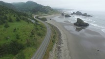 aerial view over a coastal highway 