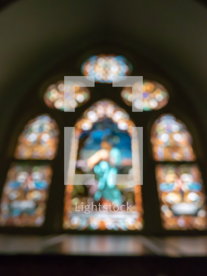 blurry stained glass window in a church 