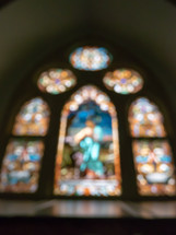 blurry stained glass window in a church 