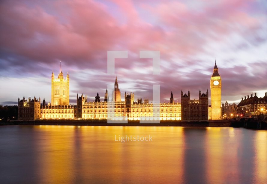Big Ben and the Houses of Parliament from across the river thames at dusk. London. England.