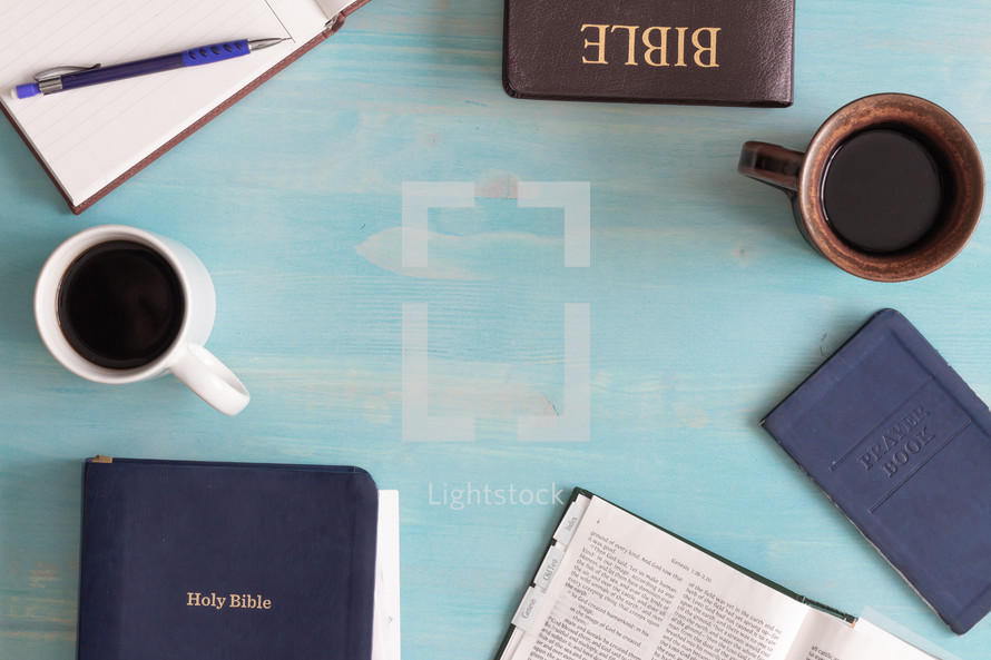 Bibles and prayer book with coffee cup 