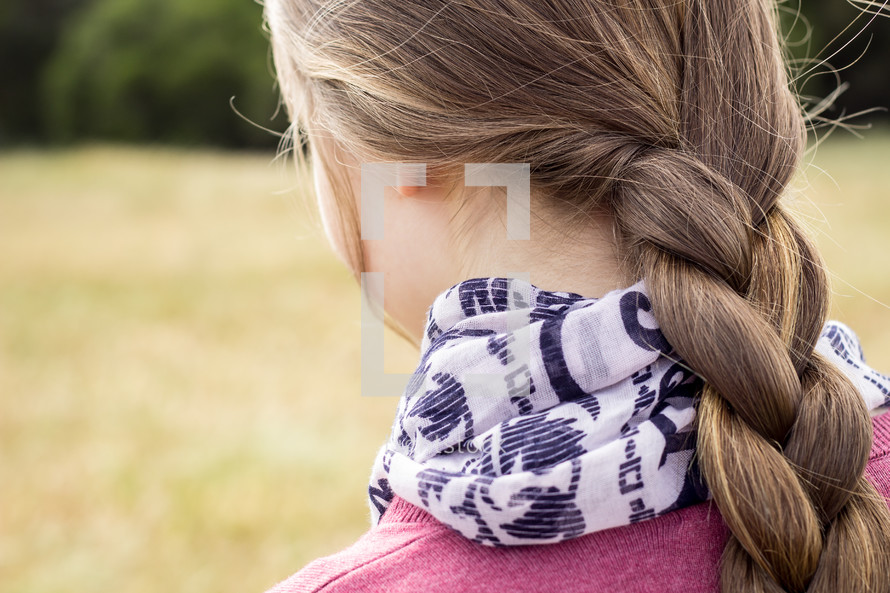 teen girl with braided hair 