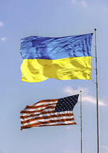 Ukrainian and American flags flying together 