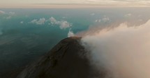 Smoke And Clouds Around Fuego Volcano In Guatemala - drone shot	