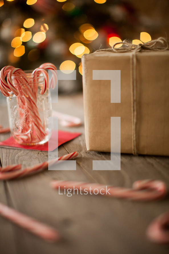 candy canes and wrapped gift 