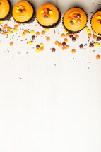 fall cupcakes border on a white background 