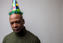 man in a party hat 