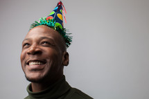 man in a party hat 