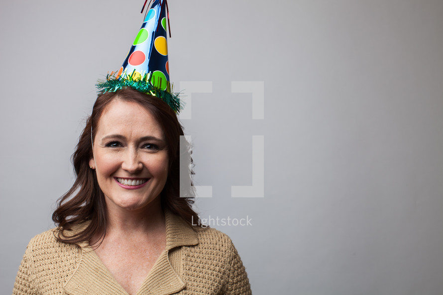 woman wearing a party hat 